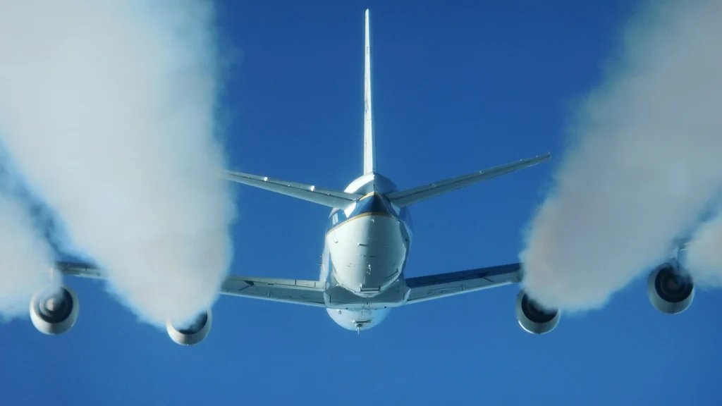 Exhaust contrails emit from the engine, which is not the case with aerodynamic contrails