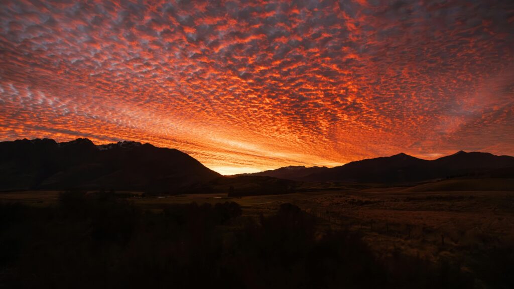 Cirrocumulus Clouds Over the Mountains at Sunset