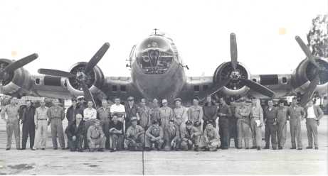 Project Cirrus crew and scientists pose in front of B-17 used in the hurricane seeding.